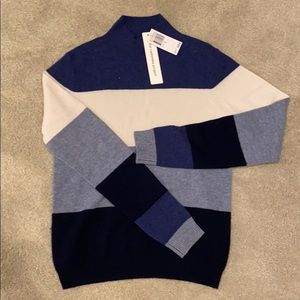 The cashmere project mock neck sweater